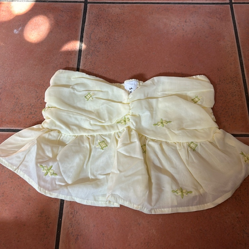 Yellow and green strapless top